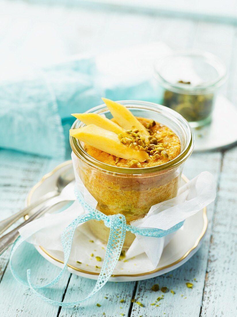 Mango and vanilla pistachio cake in a glass as a gift