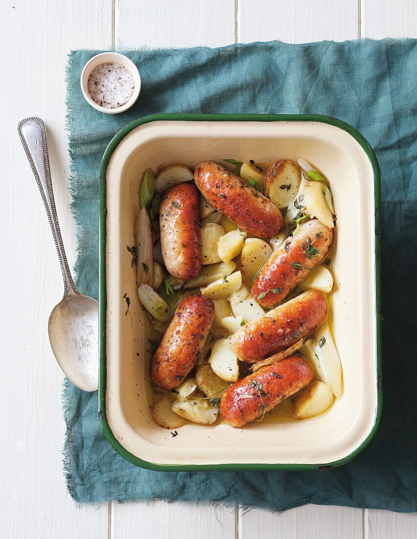 Glazed sausages on a leek medley