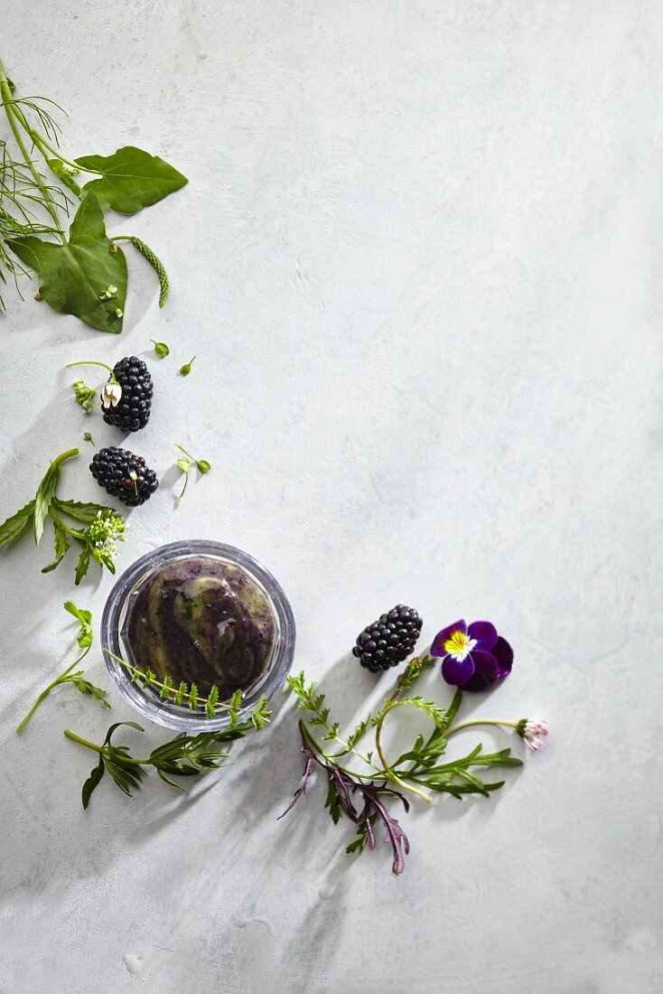 A blackberry and banana smoothie with herbs