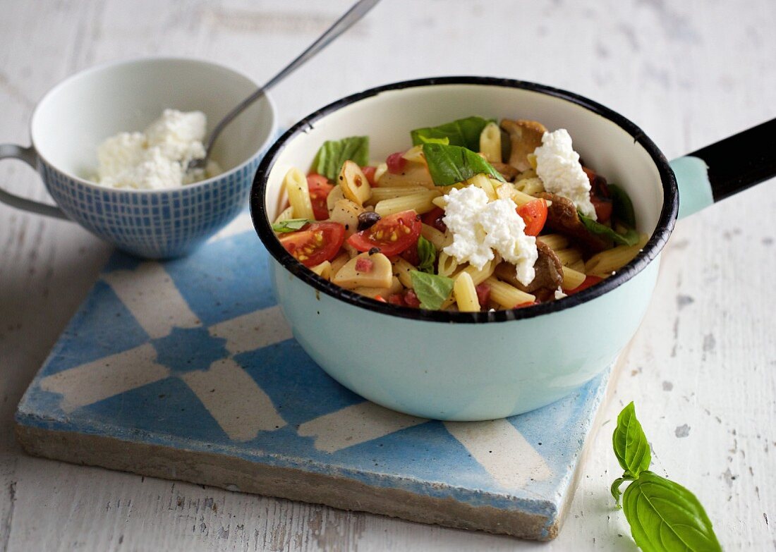 Penne pasta with king trumpet mushrooms and ham