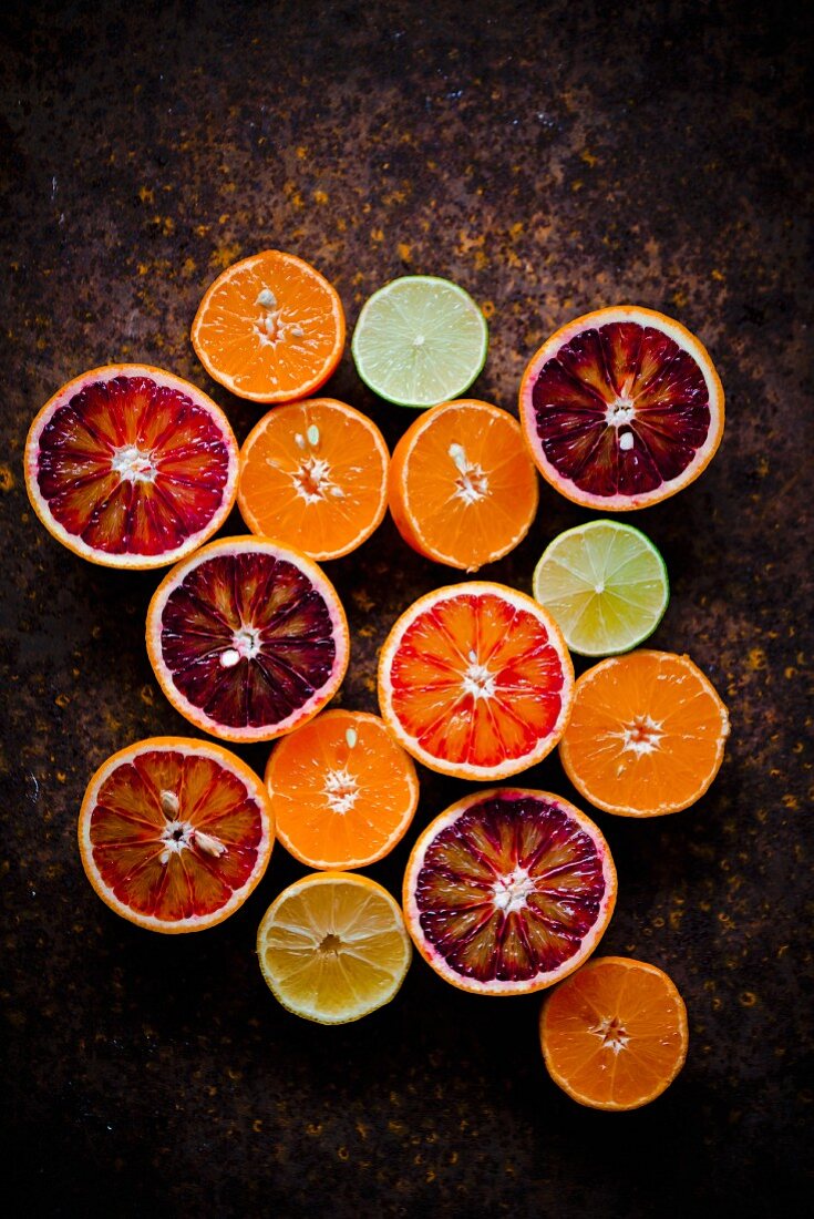 An arrangement of halved citrus fruits