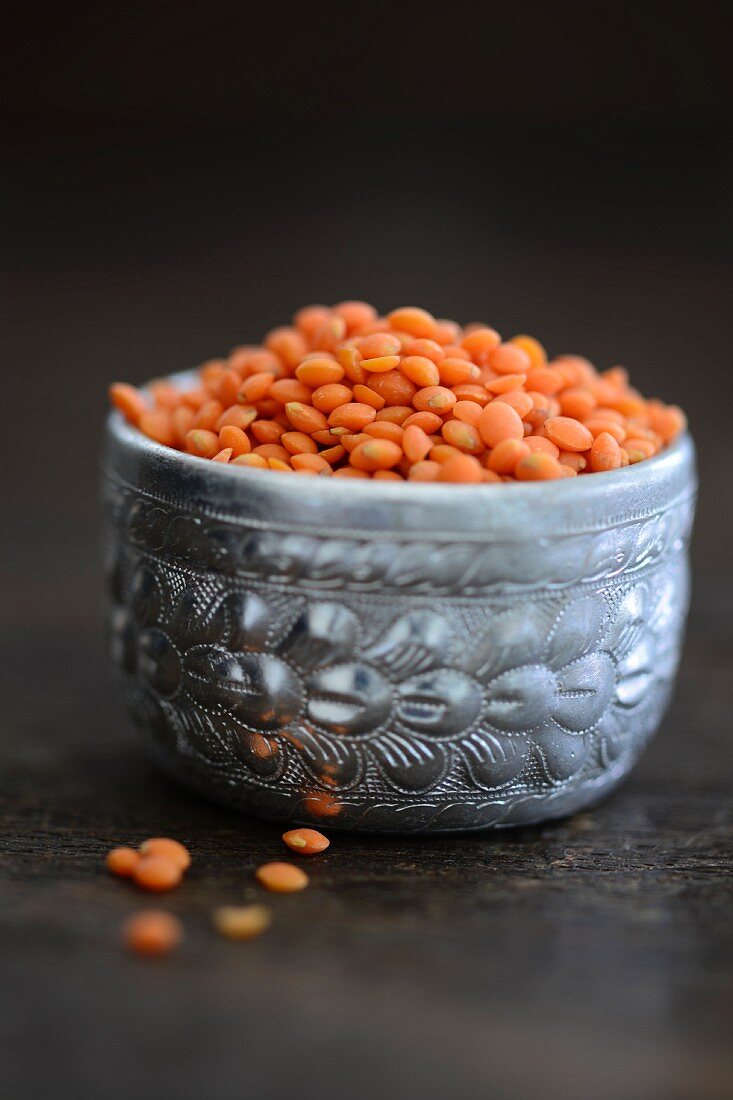 Red lentils in a silver bowl