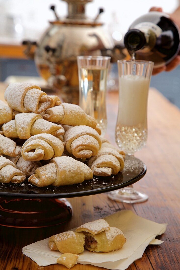 Rugelach or Rogaliki (Russian jam pastries) with champagne