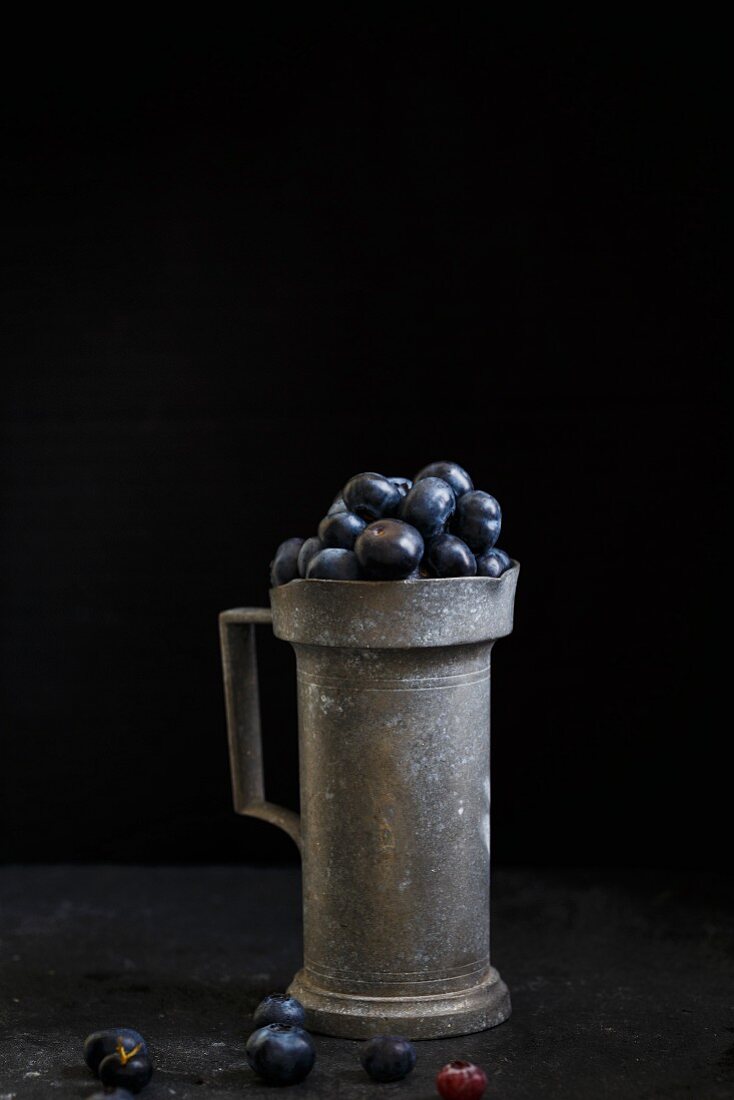 Blueberries in a rustic ceramic cup
