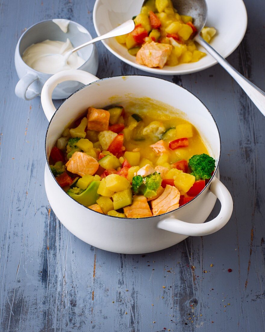 Potato soup with salmon and vegetables
