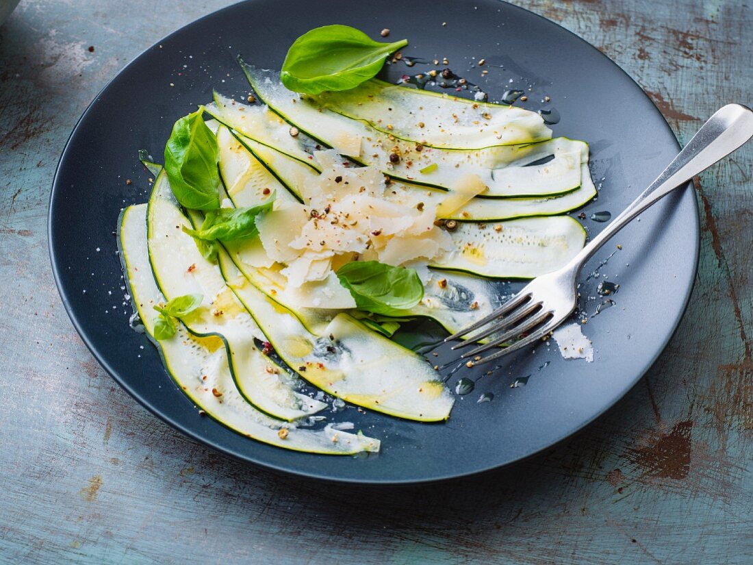 Vegetarian courgette carpaccio with fresh Parmesan cheese