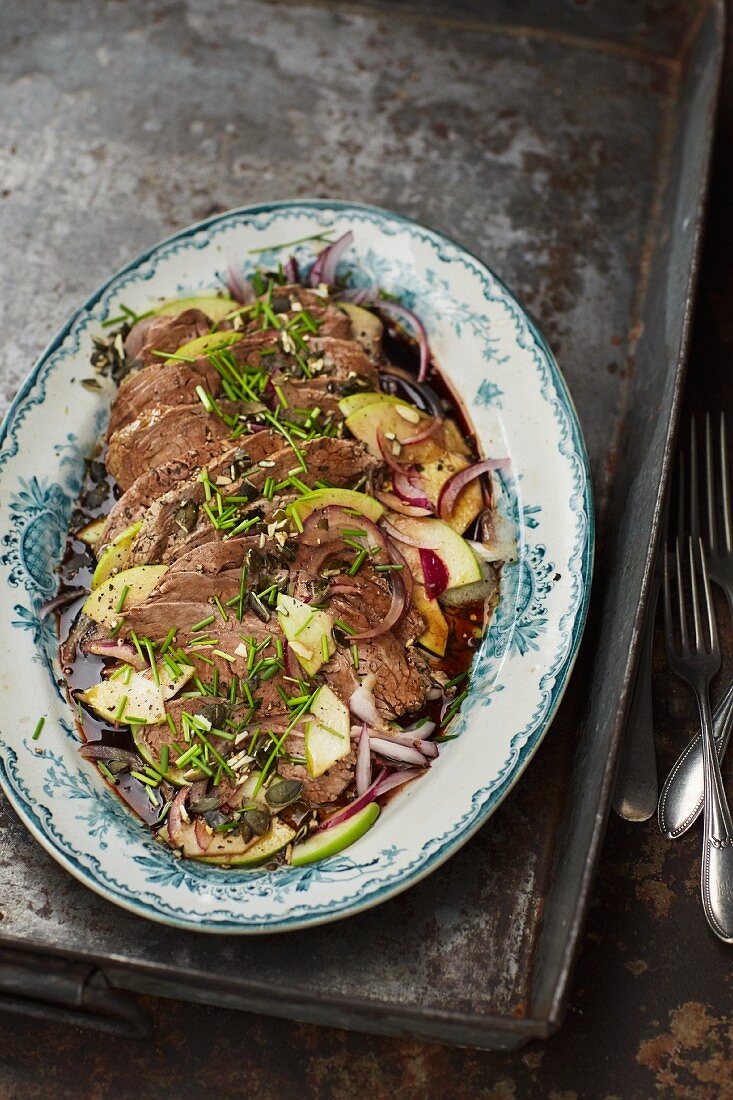 Prime boiled beef salad with apple and pumpkin seed oil vinaigrette