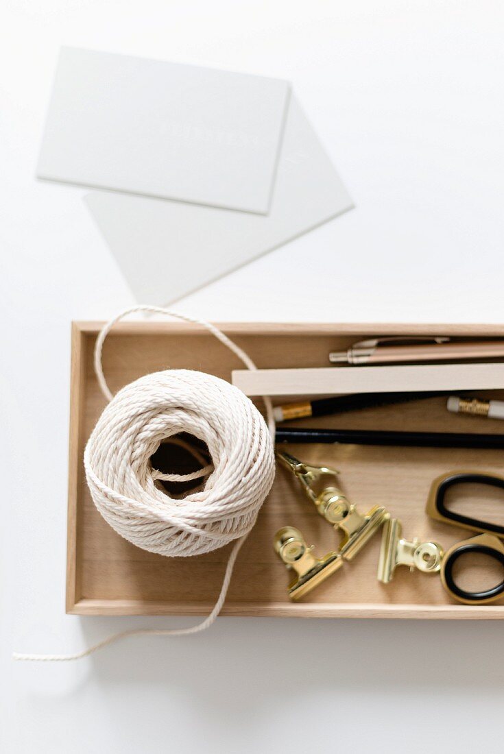 Office utensils in wooden box