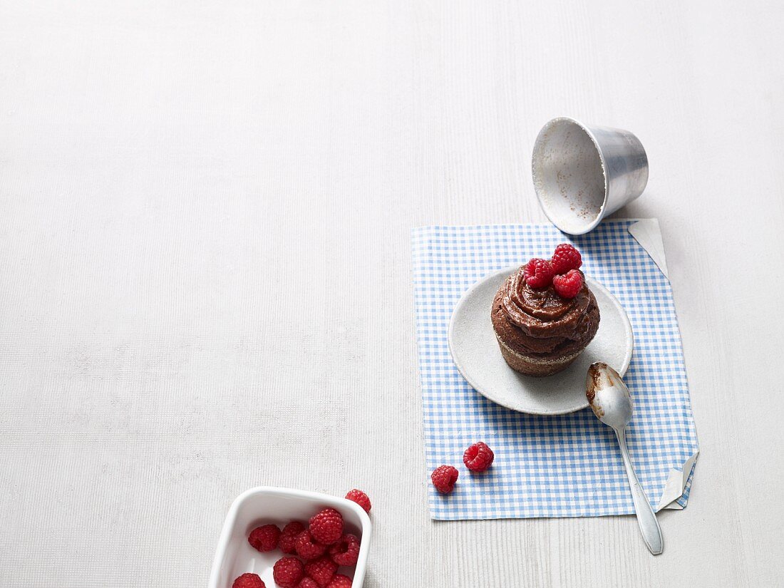 Chocolate and banana cakes with raspberries (Paleo diet)