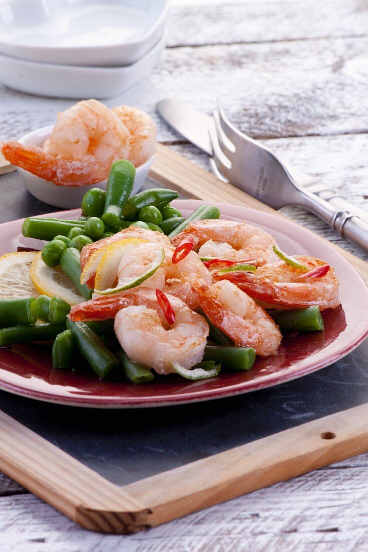 Fried prawns with beans and peas