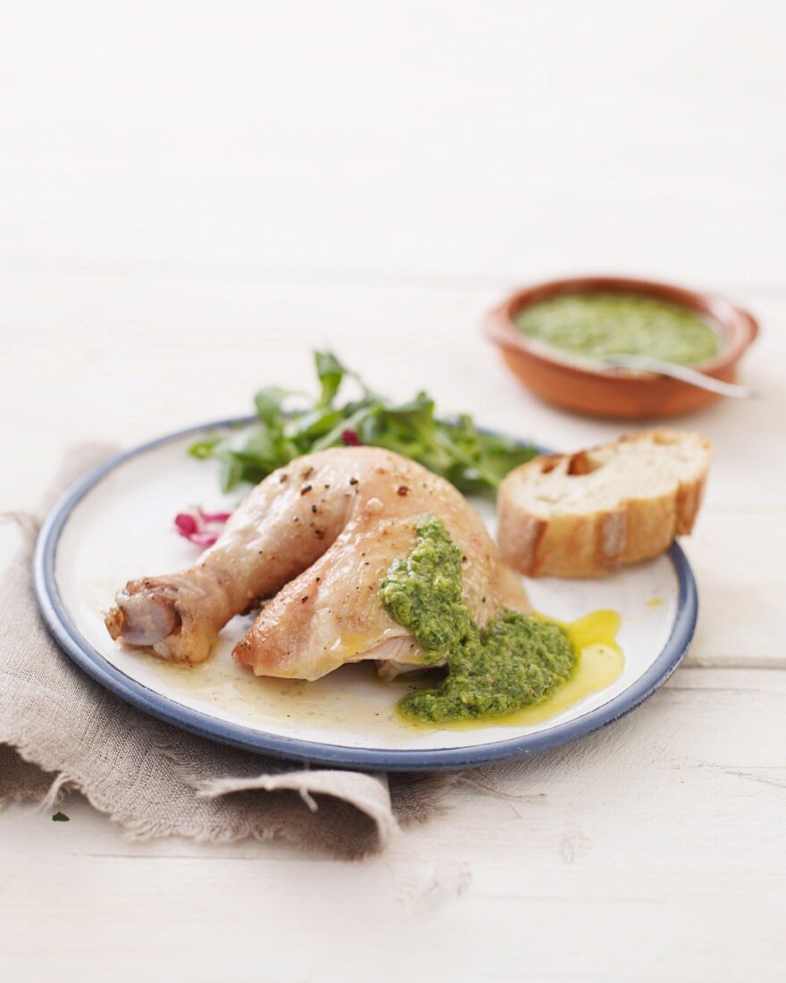 Chicken legs with an anchovy and basil sauce