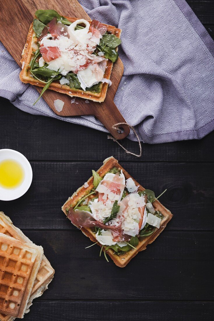 Savory waffles with prosciutto, goat's cheese, spinach and cheddar