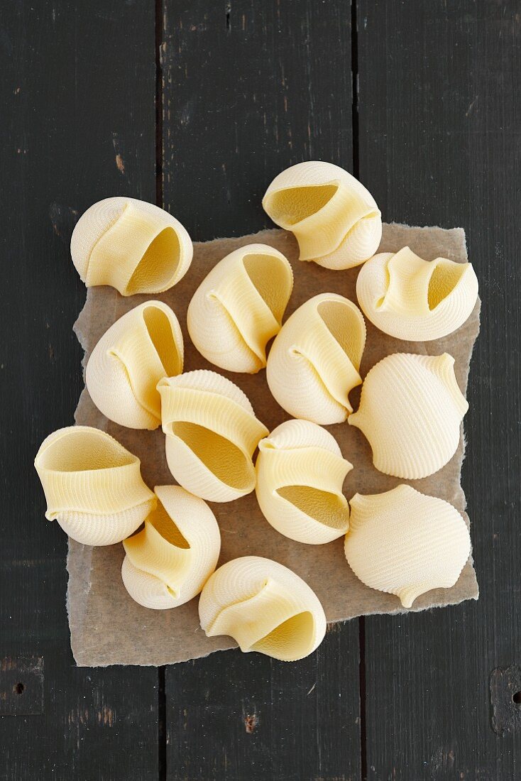 Conchiglie on a rustic wooden table