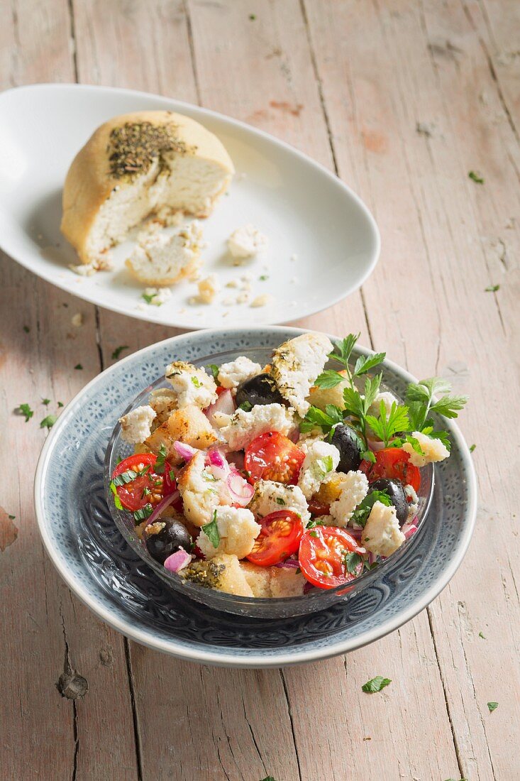 Greek bread salad with vegan almond cheese