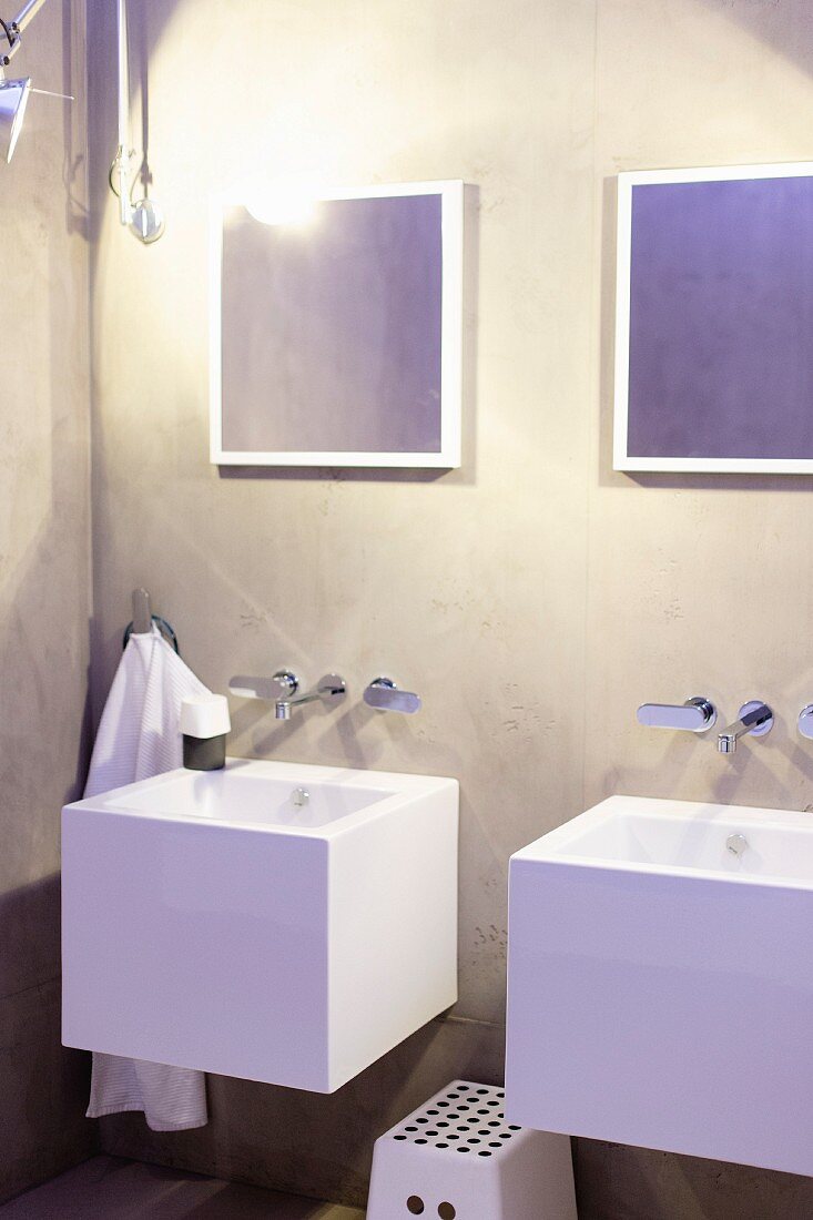 Cubic sinks in designer bathroom