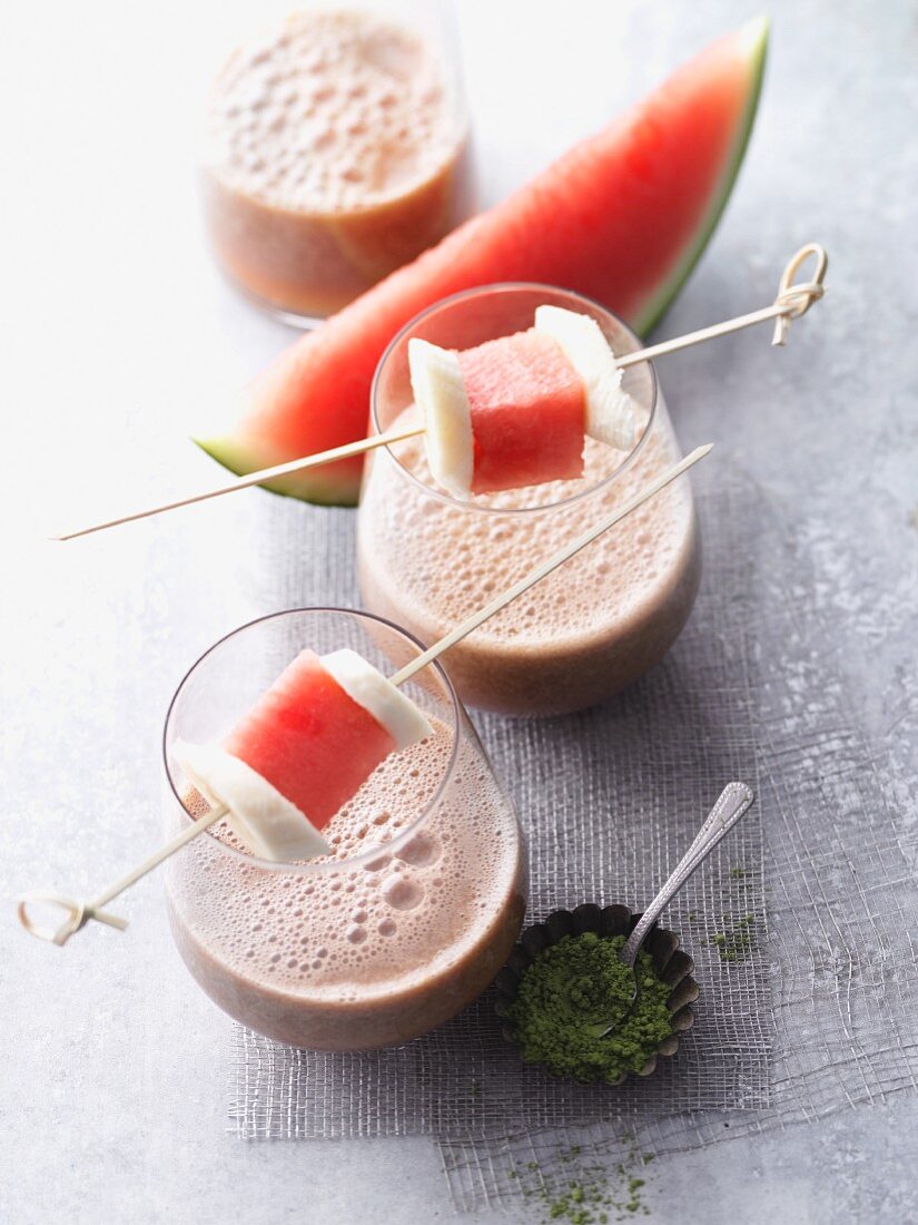 A watermelon and banana smoothie with matcha and baobab