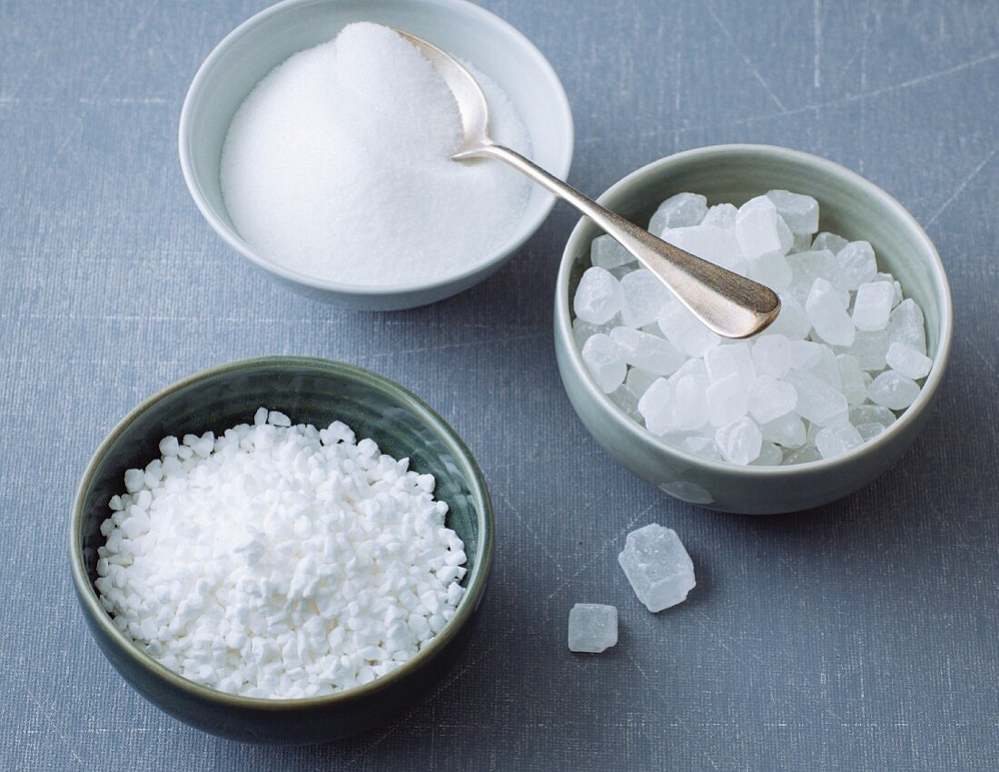 Different types of sugar (crystal sugar, rock sugar and sugar nibs)