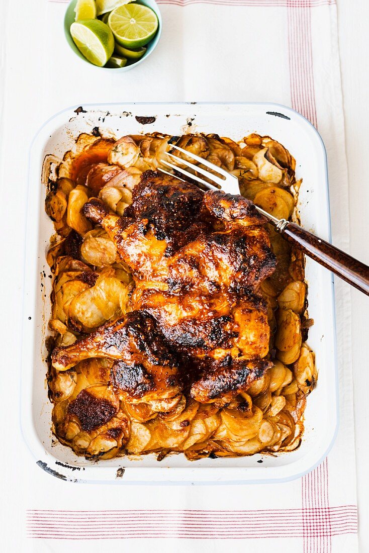 Peri-peri chicken on a bed of potatoes