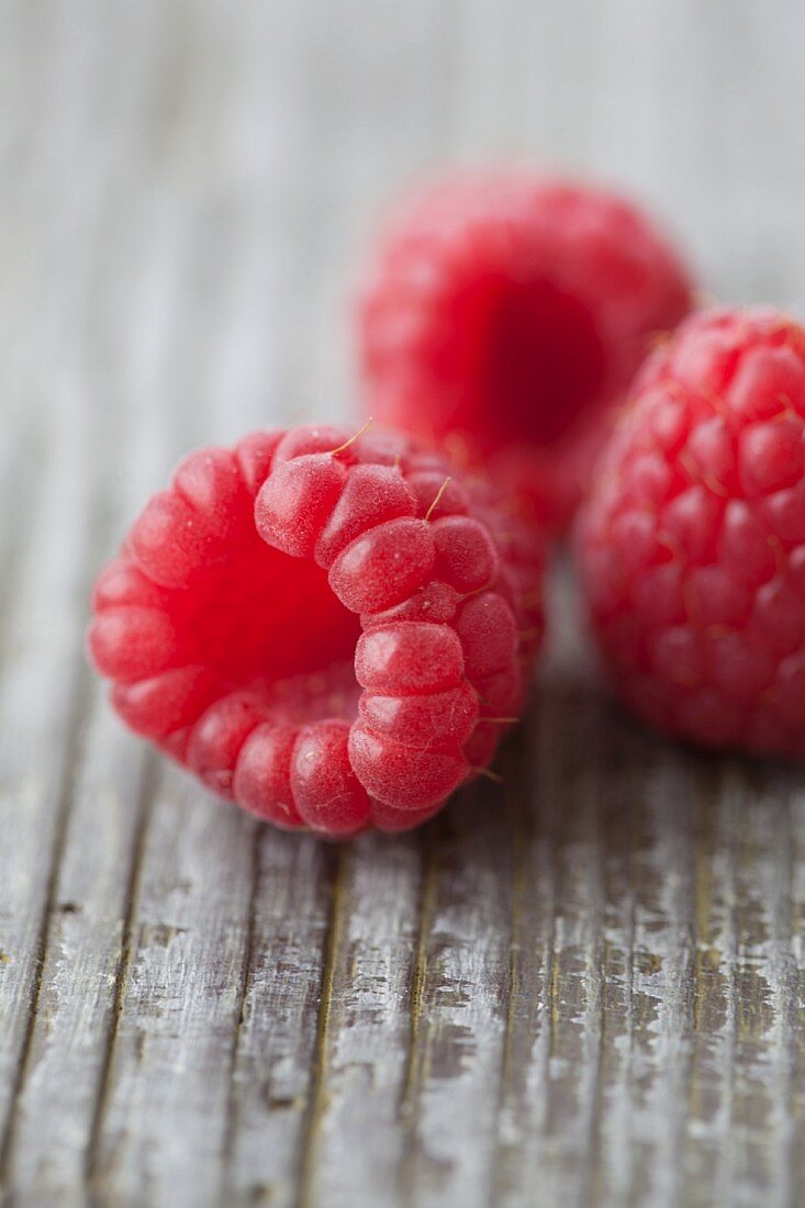 Raspberries on a wooden table