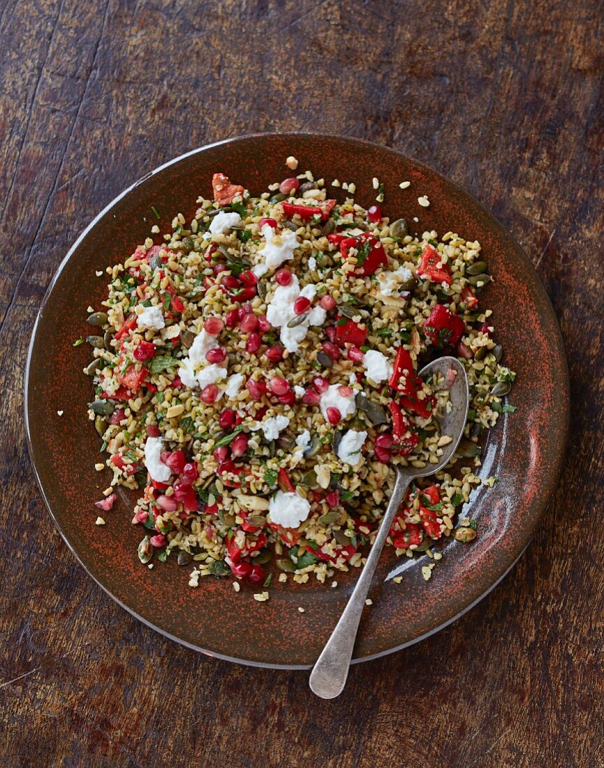 Freekah salad with pomegranate syrup and ricotta