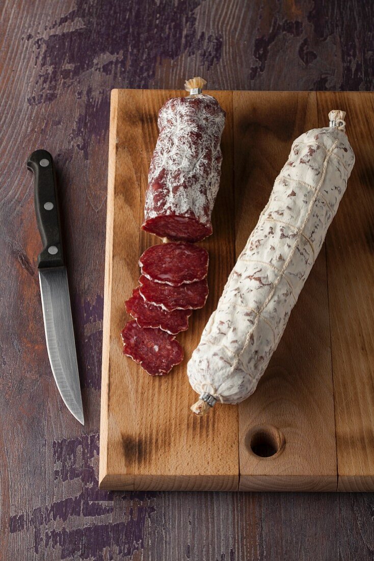 Air-dried salami on a wooden board