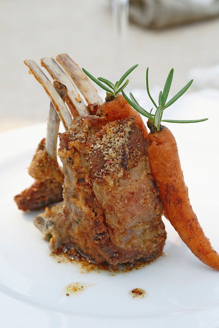 Herb lamb chops with glazed baby carrots