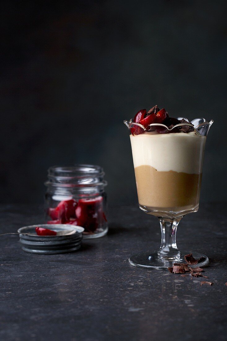 Two layers of chocolate mousse with cherries