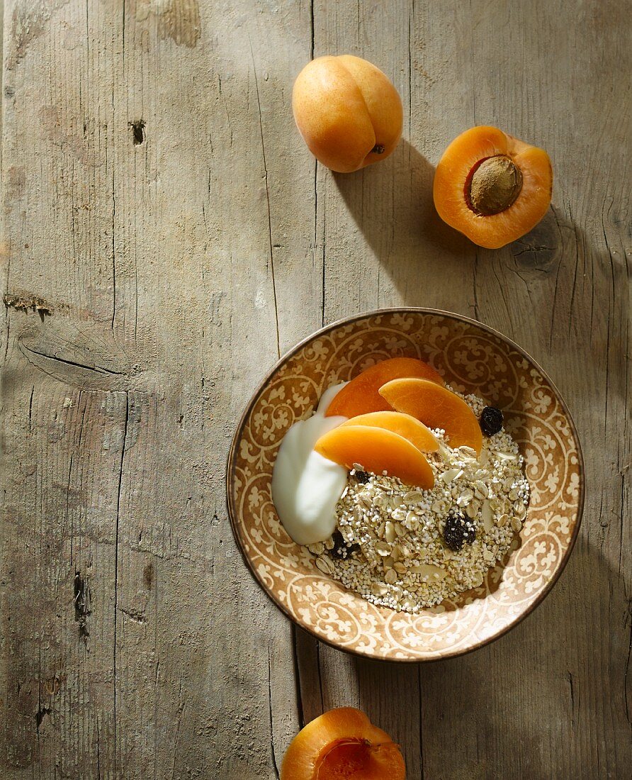 Healthy muesli with apricots and yoghurt