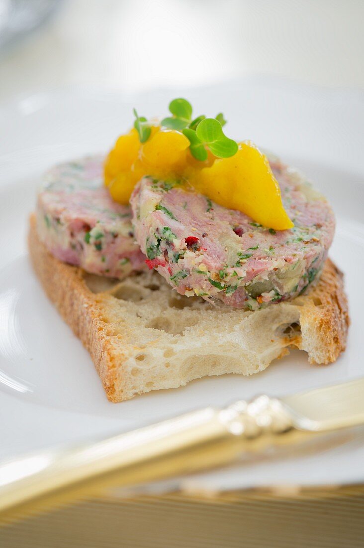 Bread topped with meat pâté for Christmas