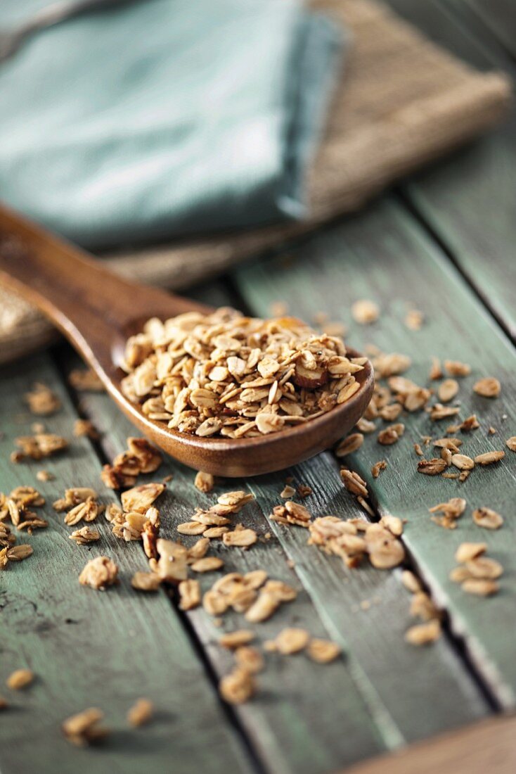 Granola on a wooden spoon