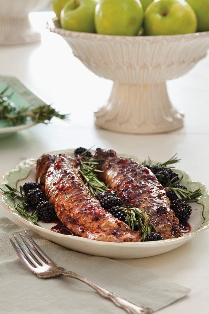 Pork with blackberries and rosemary
