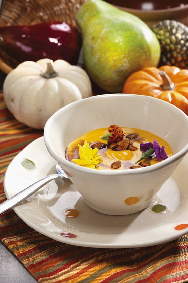 Squash soup with toasted pumpkin seeds