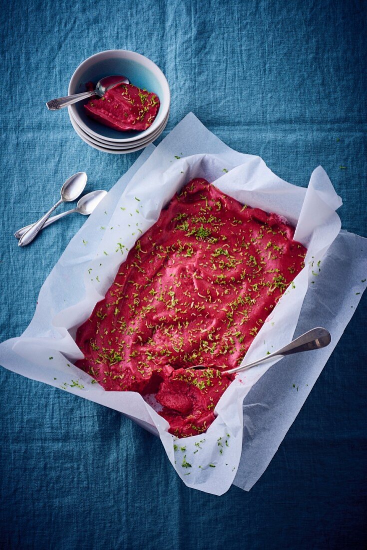 Homemade strawberry ice cream with lime zest