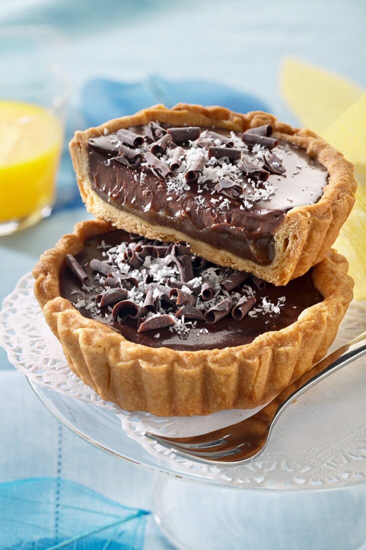 Exotic tartlets with dark chocolate cream and pineapple