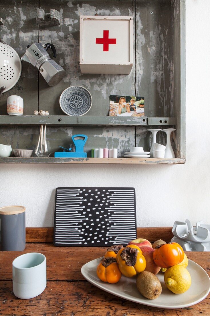 Fruit bowl below kitchen shelf made from old drawer