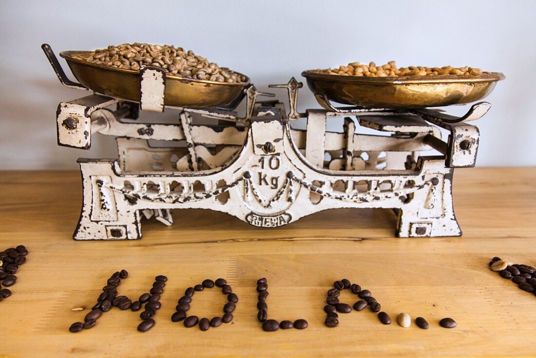 Coffee beans on an old pair of scales in a cafe in Bogota, Colombia