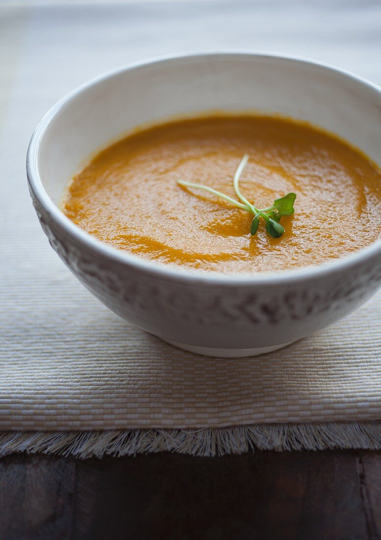 Organic carrot and ginger soup with cress
