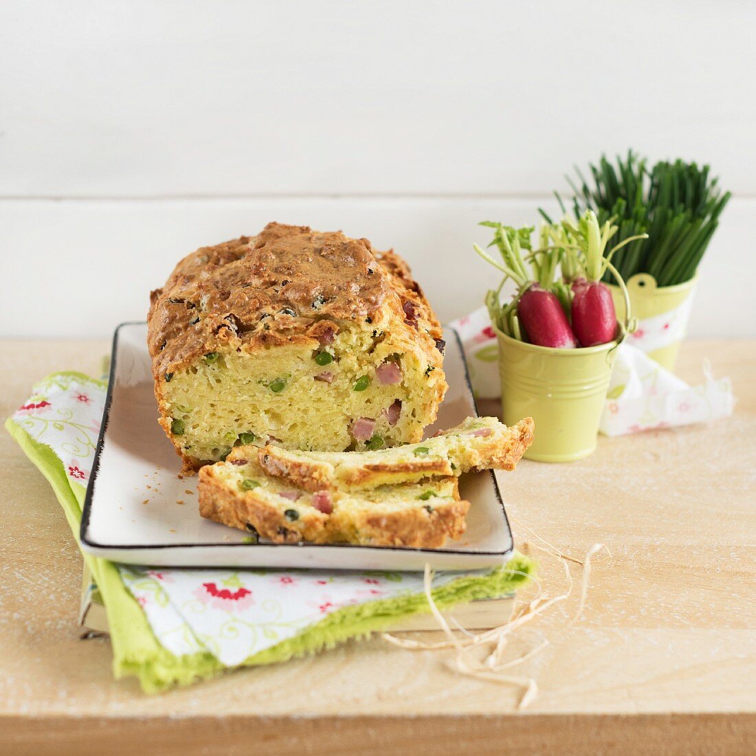 Savoury cake with Comté cheese, peas and ham