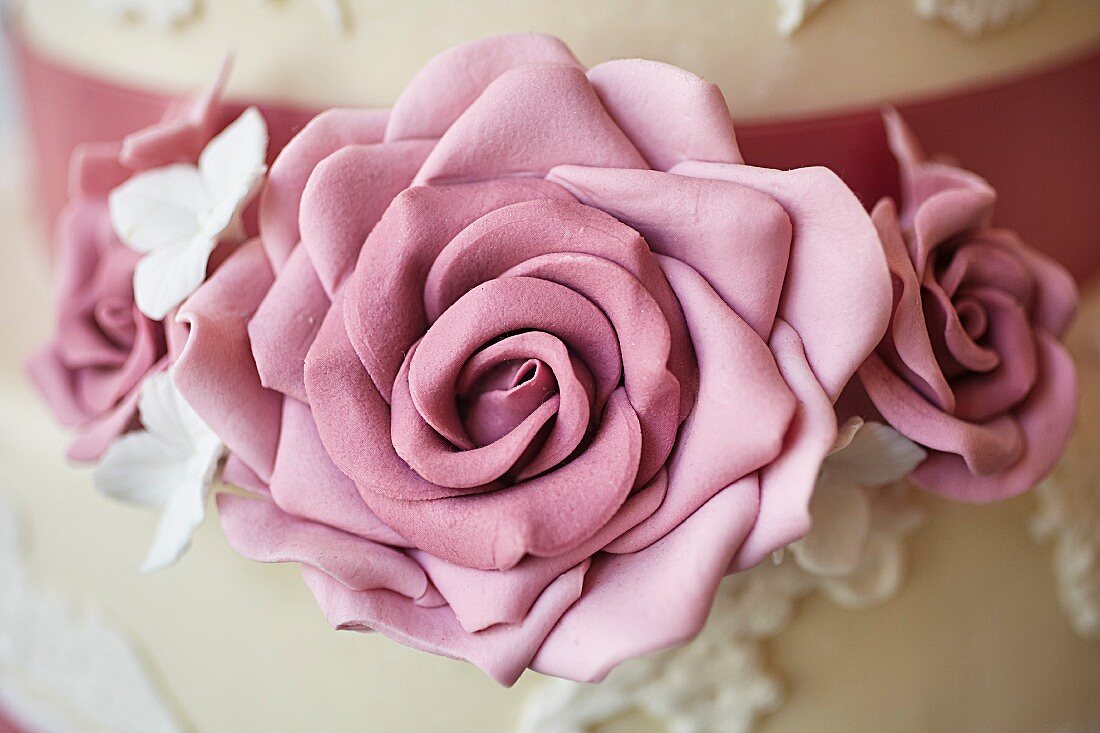 A wedding cake decorated with marzipan roses (detail)