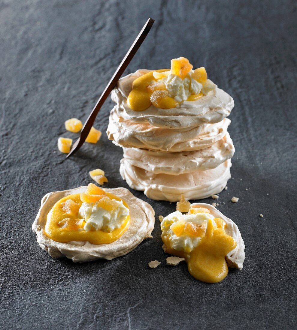 Meringues with ginger cream, whipped cream and candied ginger