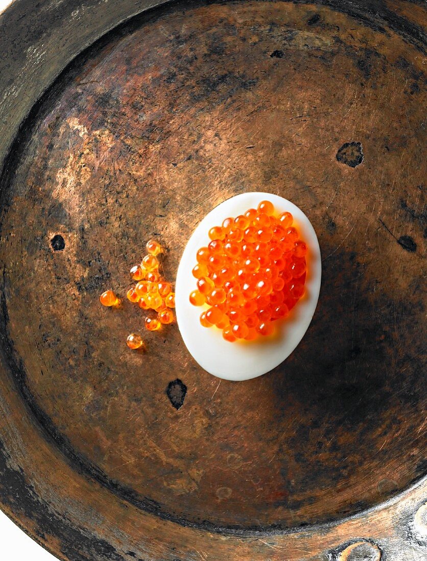 A hard-boiled egg with caviar