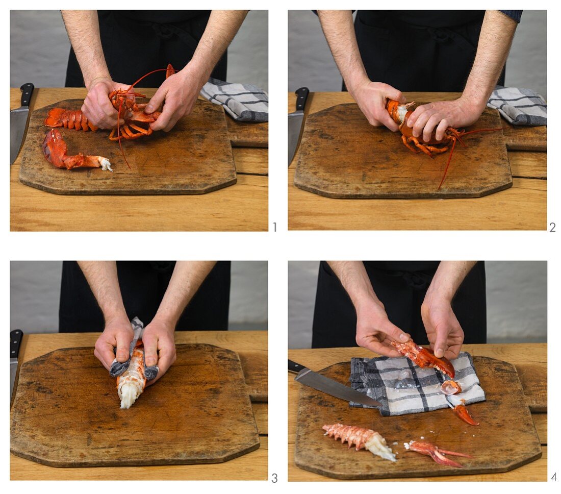 Cooked lobster being cracked open to remove the meat