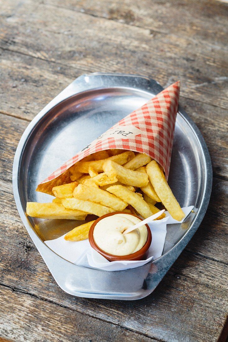 Chips in a cone with mayonnaise