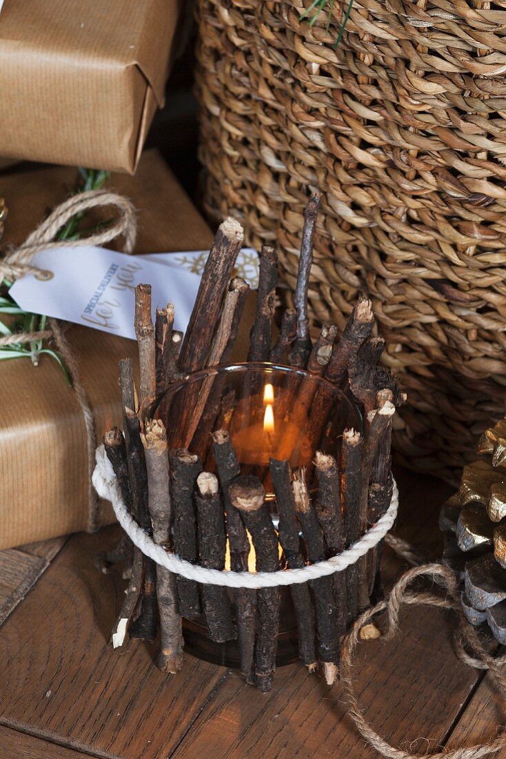 Tealight holder surrounded by twigs
