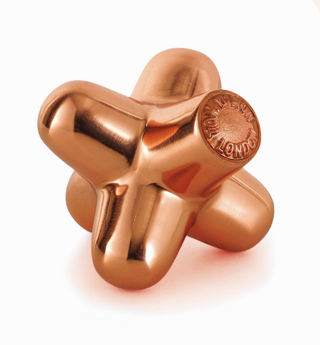 A copper paperweight or door stopper