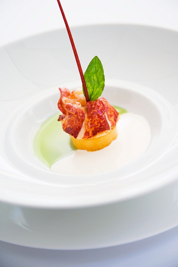 Brittany lobster with Charentais melon and basil oil