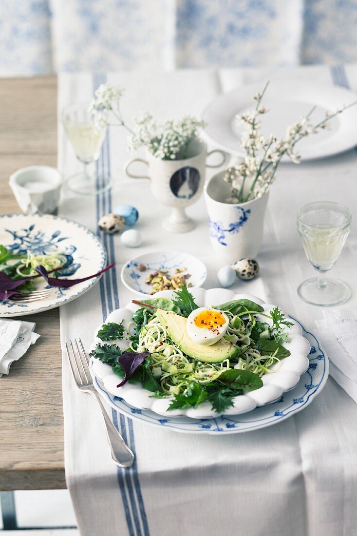 Courgette and apple salad with avocado and egg for Easter