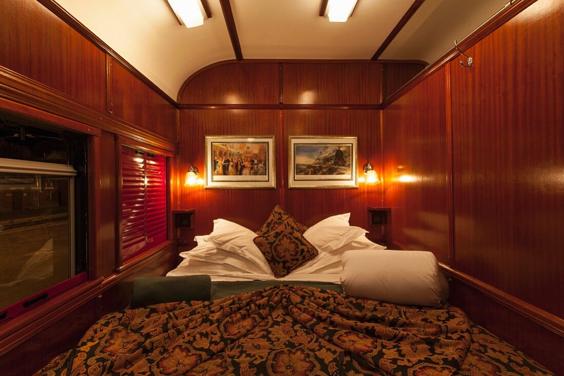 A bed in a suite in the luxury train Rovos Rail (journey from Durban to Pretoria, South Africa)