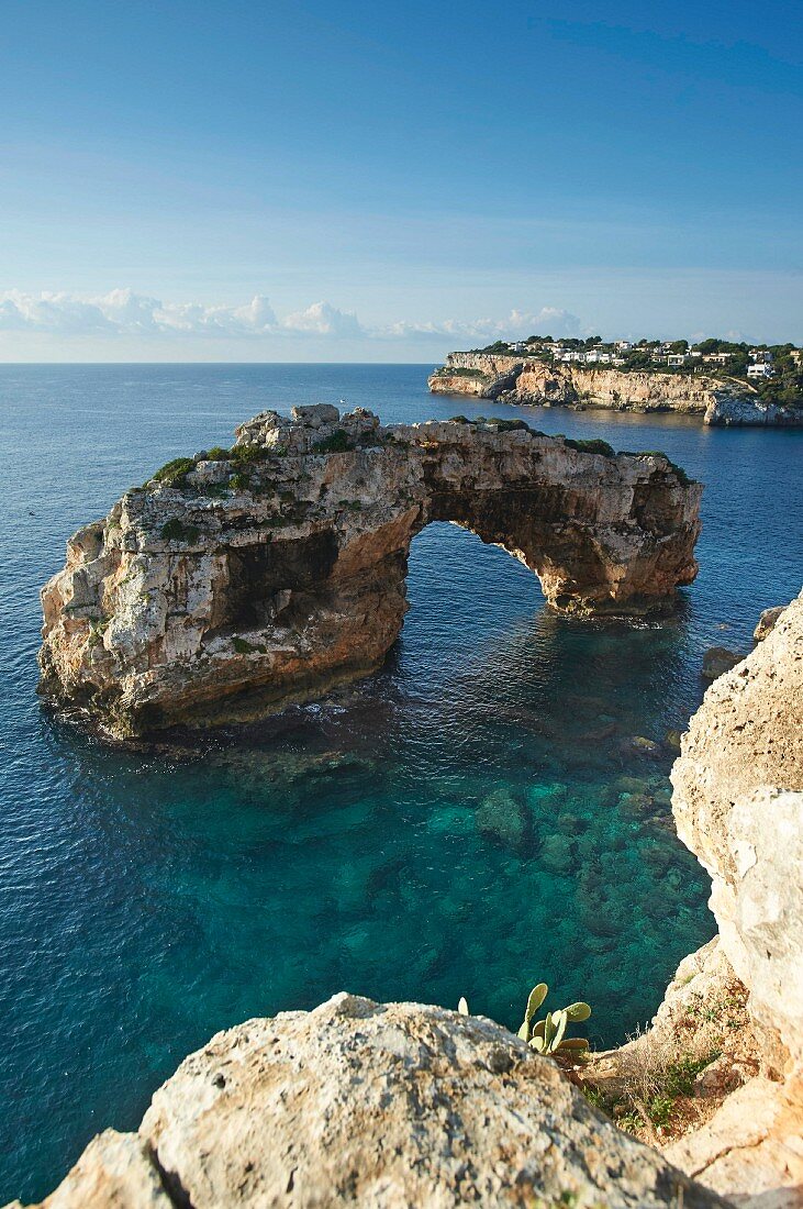 A natural arch between Cala Santanyí and Cala Llombards, Majorca, Spain