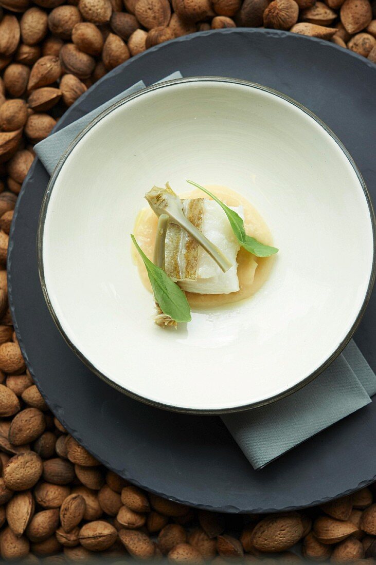 Cod confit with artichokes and quince purée